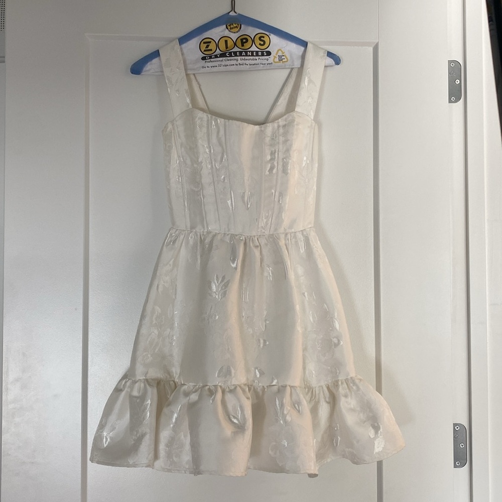 white mini dress with jacket